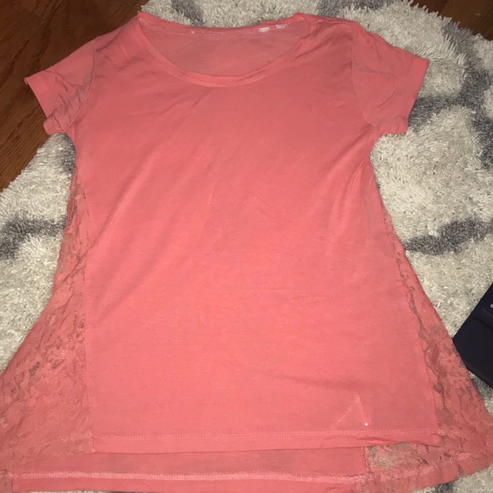 a coral shirt
